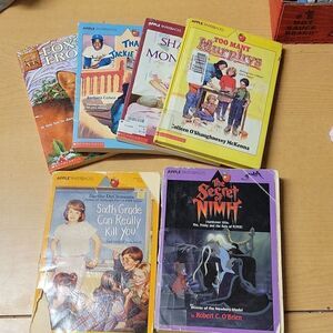 6 scholastic paperback books.  